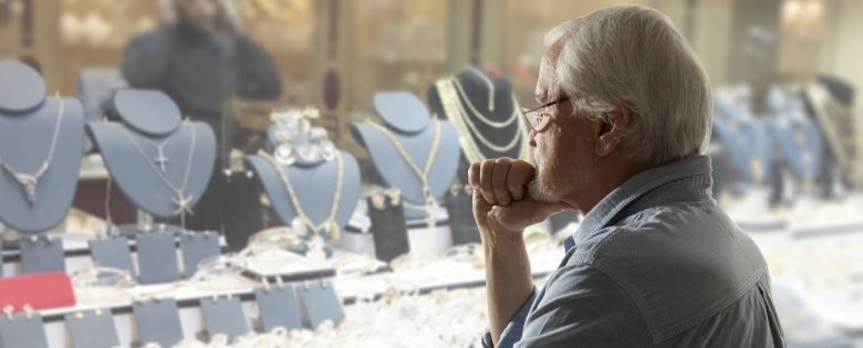 Man looking at jewelry